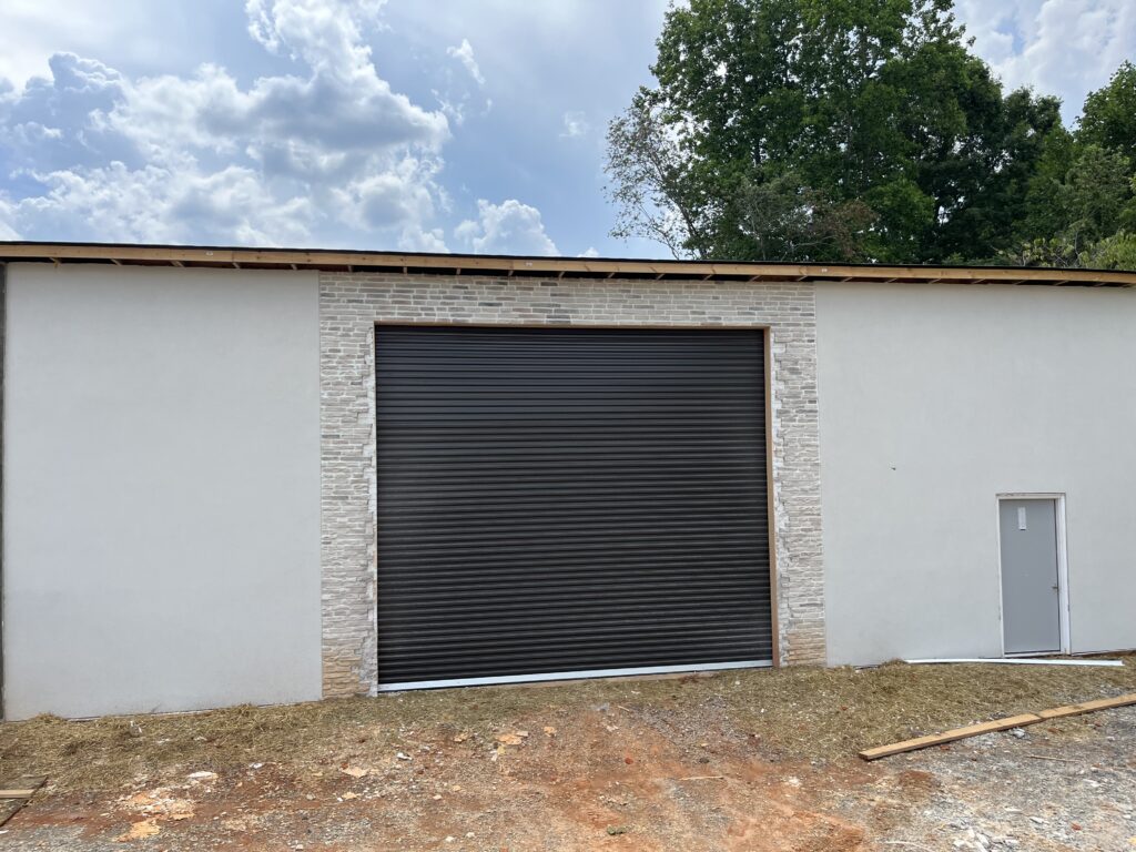 black commercial roll up garage door